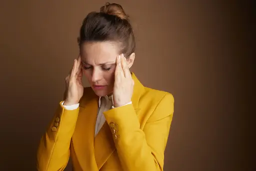 Woman experiencing stress.